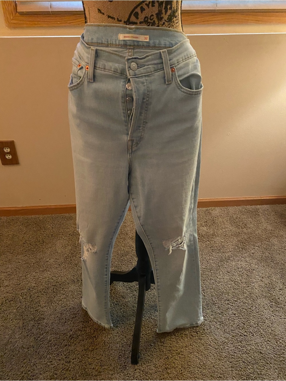 Levi's Light Blue Flare Jeans with Knee Distress